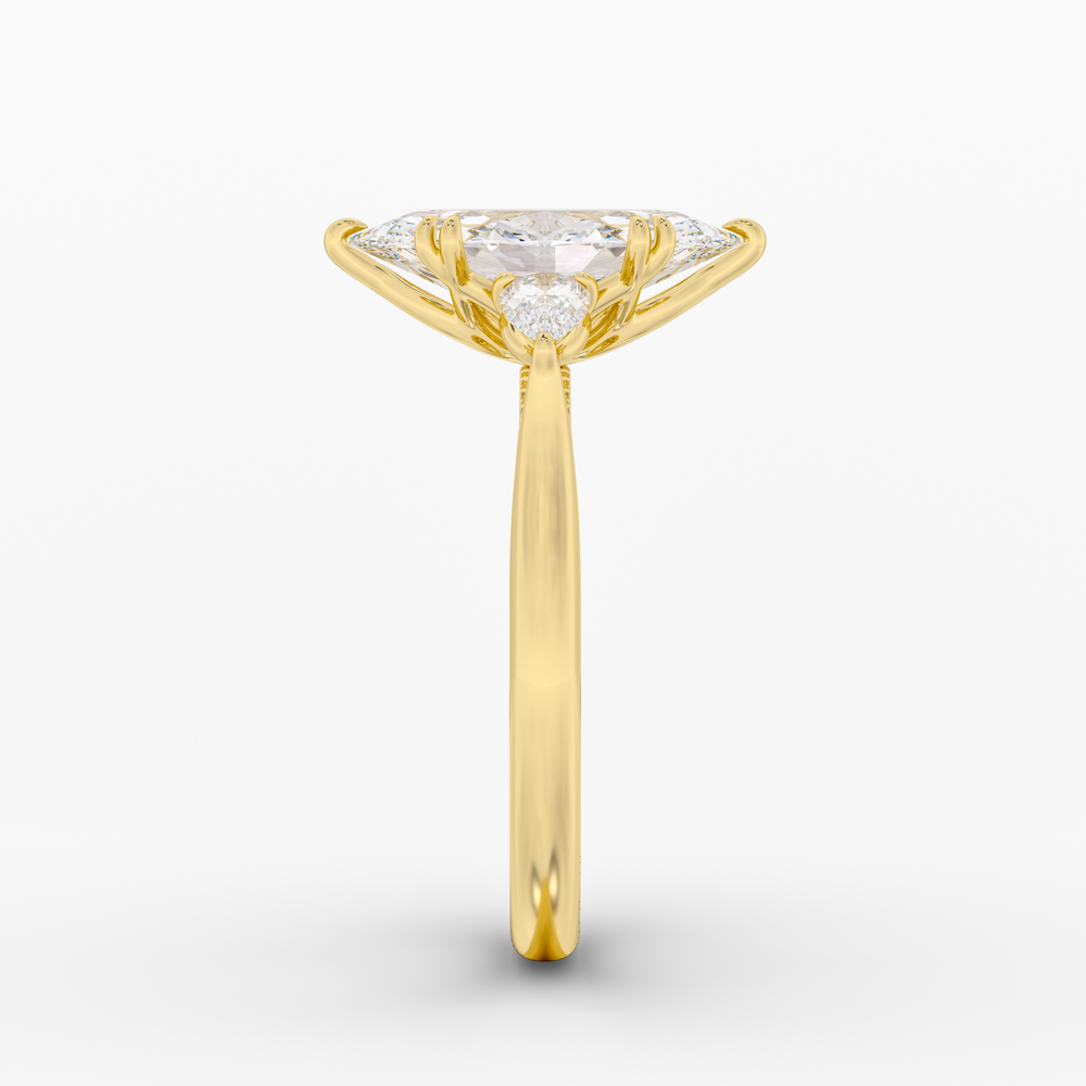 Aurelian Marquise engagement ring setting in 18K yellow gold, side view.