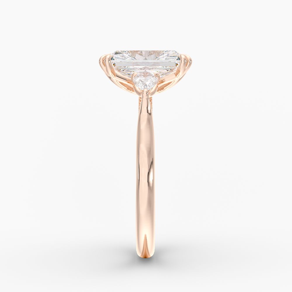 Aurelian Radiant engagement ring setting in 18K rose gold, side view.