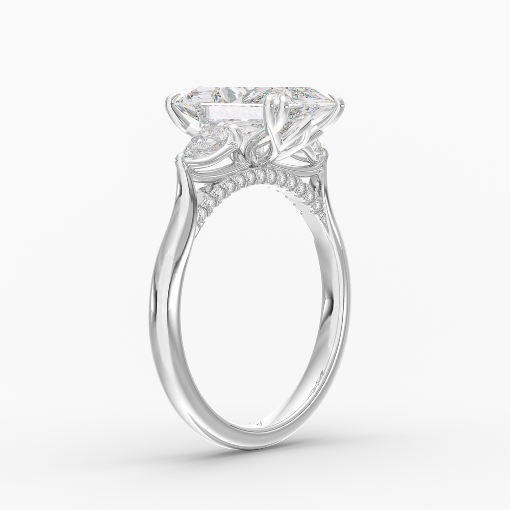 Aurelian Radiant engagement ring setting in 18K white gold, three-quarter view.