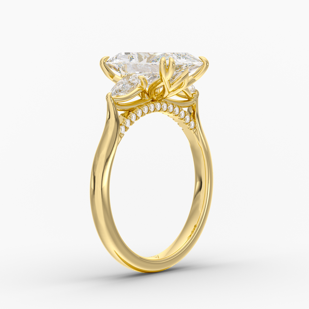 Aurelian Radiant engagement ring setting in 18K yellow gold, three-quarter view.
