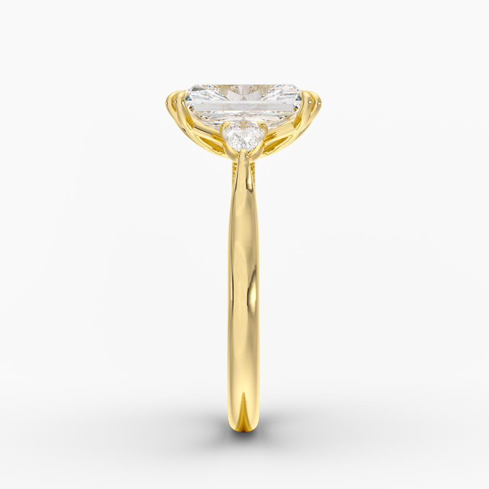 Aurelian Radiant engagement ring setting in 18K yellow gold, side view.