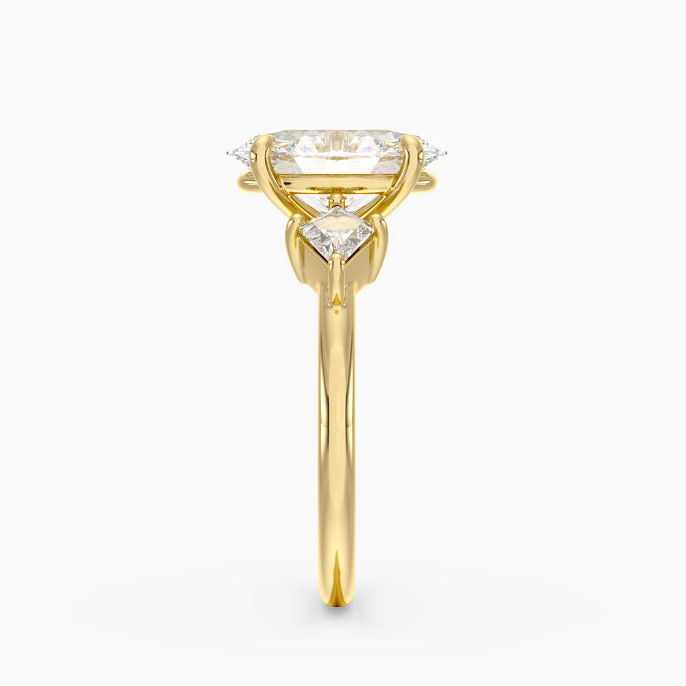 Valenne Oval engagement ring setting in 18K yellow gold, side view.