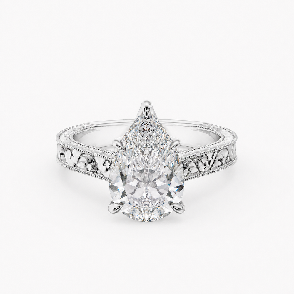 Florent Pear engagement ring setting in 18K white gold, front view.