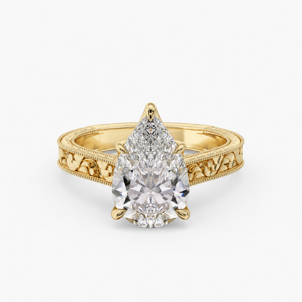 Florent Pear engagement ring setting in 18K yellow gold, three-quarter view.