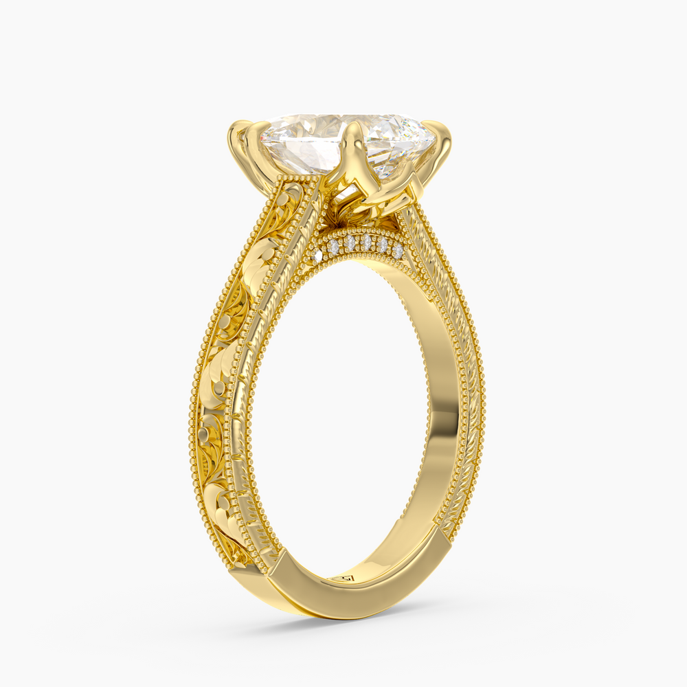 Florent Pear engagement ring setting in 18K yellow gold, three-quarter view.