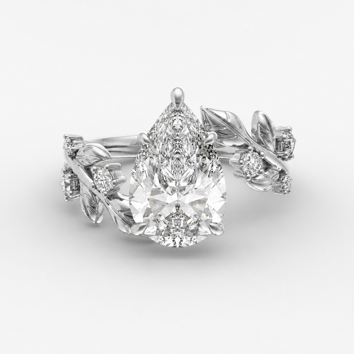 Ember Pear engagement ring setting in 18K white gold, front view.