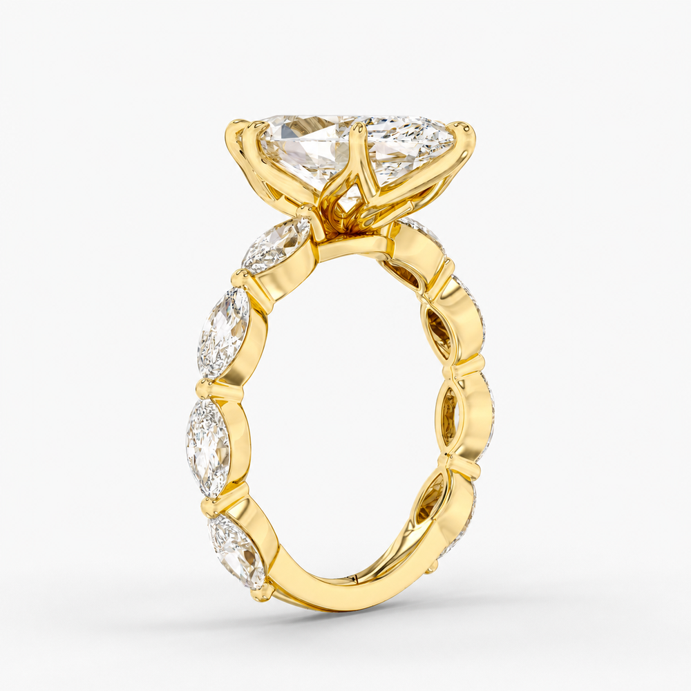 Lunara Marquise engagement ring setting in 18K yellow gold, three-quarter view.