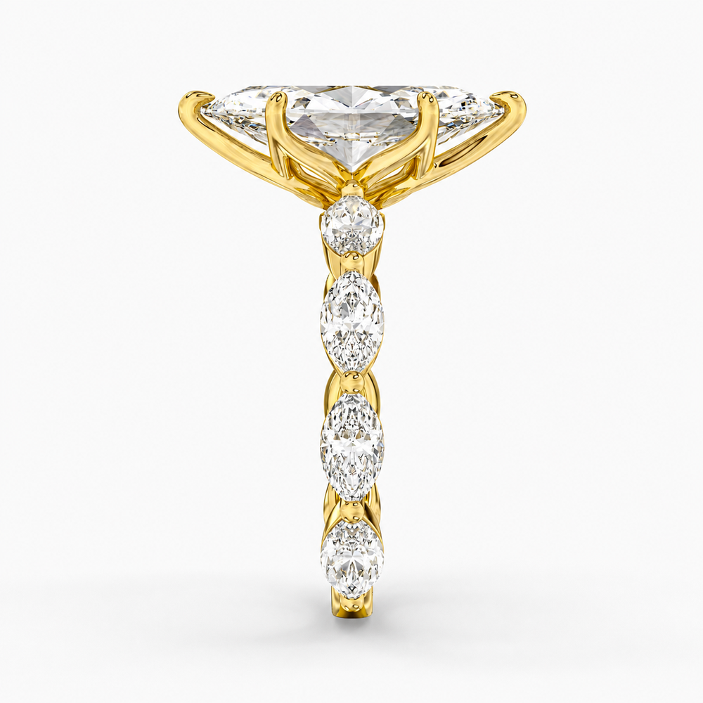 Lunara Marquise engagement ring setting in 18K yellow gold, three-quarter view.