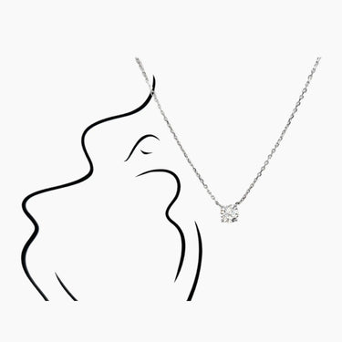 Round Four Prong Solitaire Pendant - <p style=line-height: 1.3;>Introducing our elegant Solitaire Diamond Pendant Necklace, featuring a single, brilliantly-cut round diamond that takes center stage. This minimalist yet captivating design embodies the essence of understated sophistication. <br><br>The price shown includes the combined cost of your selected main diamond and setting.</p > - Lab Grown Diamond Necklace - model wear view